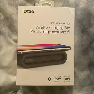 BRAND NEW charging pad, never opened